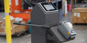 Custom weight scale with touch screen and printer in an industrial setting, designed for tailored weighing solutions