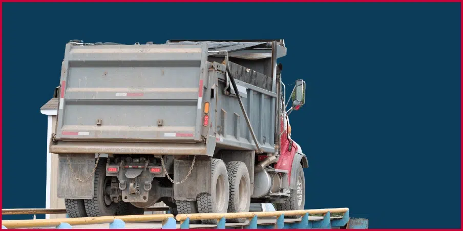 A truck scale measuring the weight of a heavy-duty dump truck, ideal for temporary and on-site weighing solutions in construction, logistics, and much more.