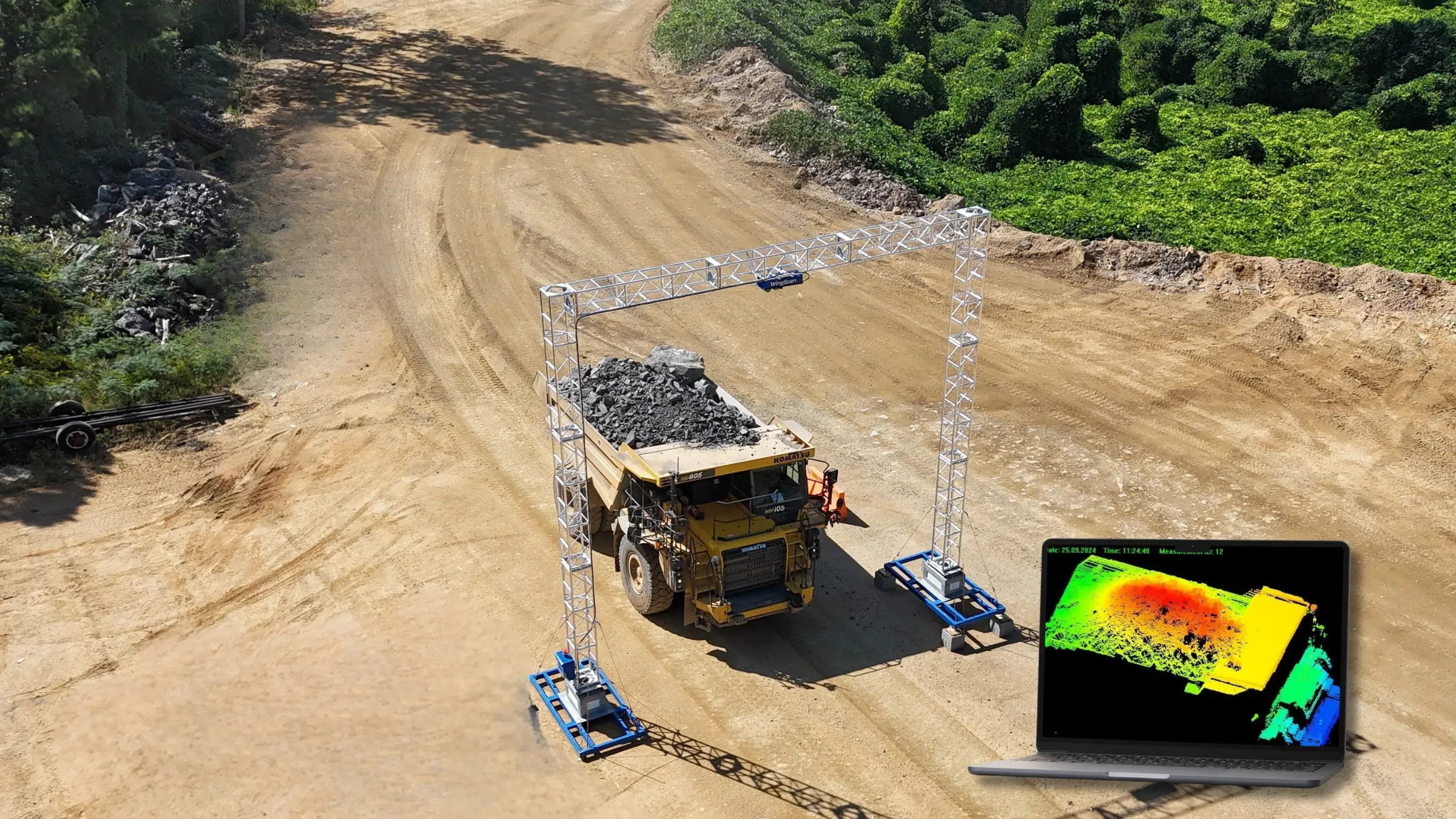 WingScan load scanner measuring a mining haul truck while a 3D load profile visualizes load distribution, fill factor, and payload analysis